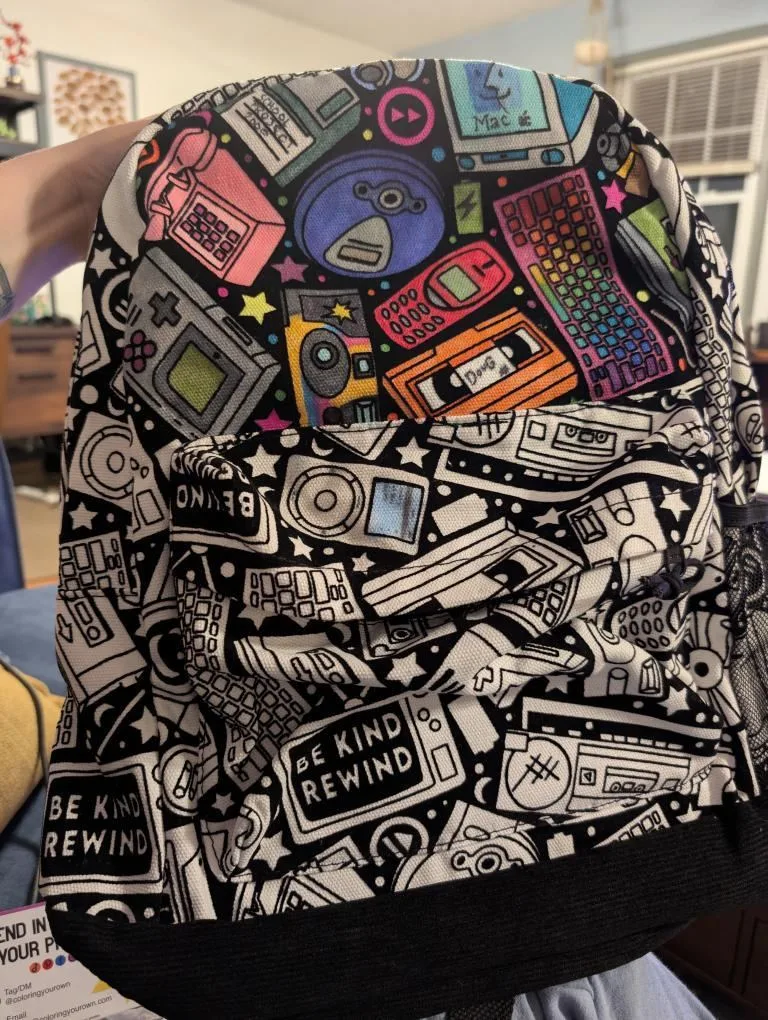 A Coloring Your Own backpack, partly colored in