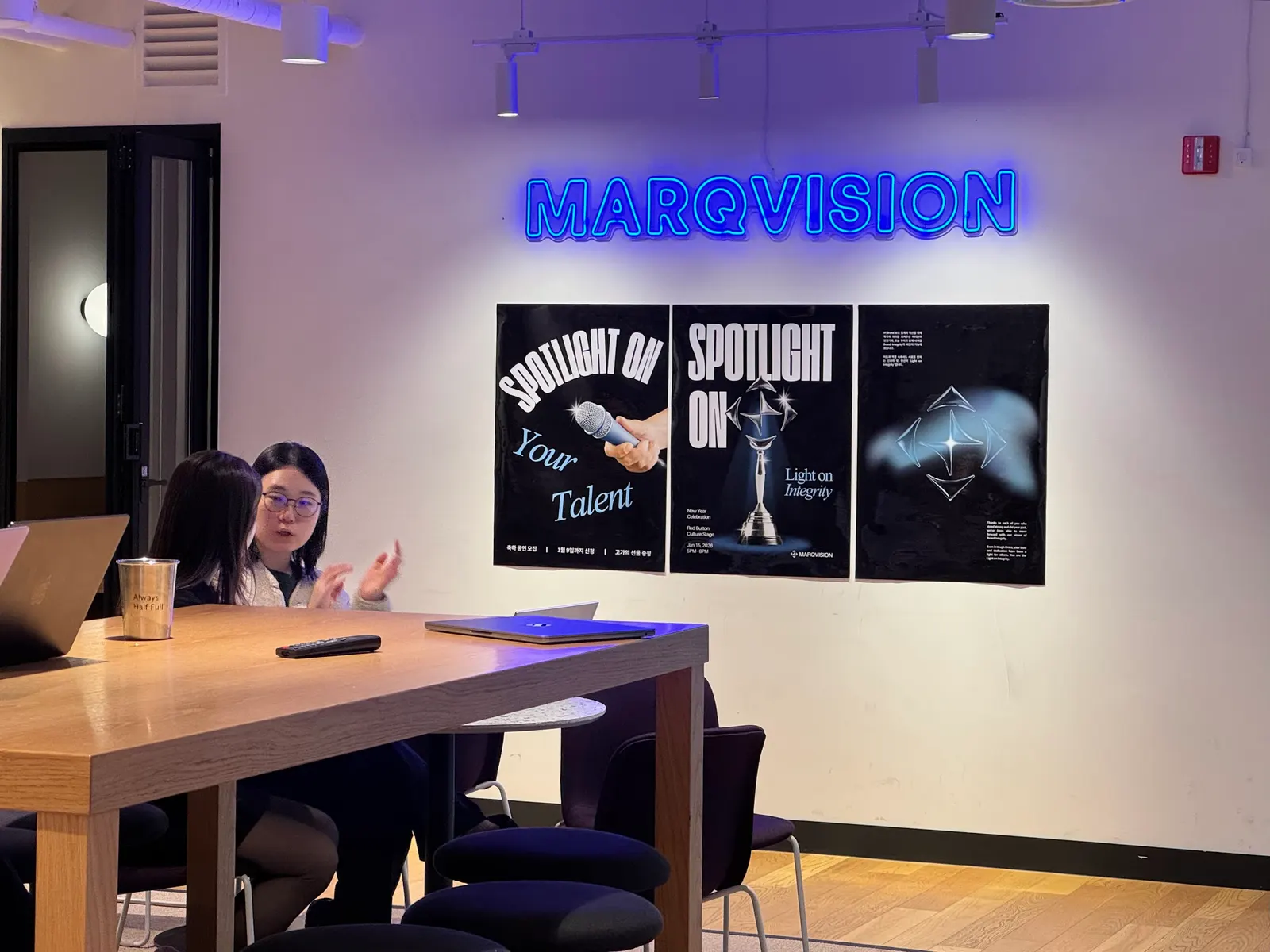 The MarqVision Seoul office, with the logo lit above a meeting table