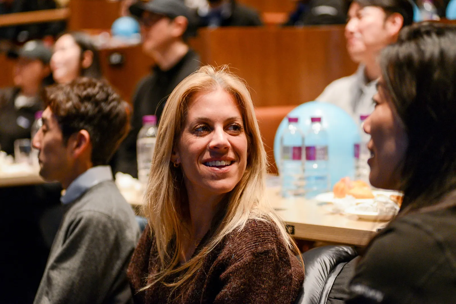 A colleague smiling during the event